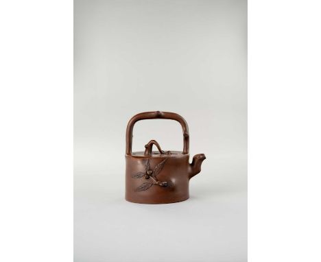 A CHINESE YIXING 'PEACH' TEAPOT AND COVER BY HE DAOHONG 20TH CENTURY  The body formed as a peach tree trunk segment, the upri