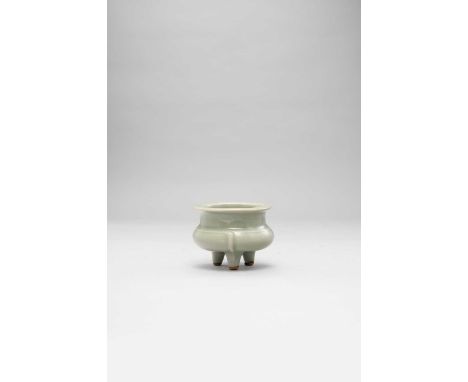 A SMALL CHINESE LONGQUAN CELADON TRIPOD INCENSE BURNER SONG DYNASTY  The compressed circular body with an everted flattened r