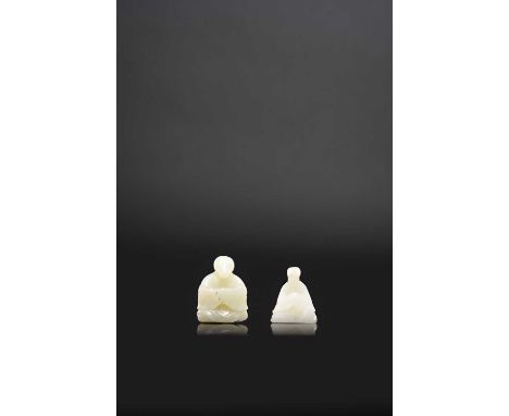 TWO CHINESE JADE ZODIAC SNAKE’S-HEAD FIGURES18TH CENTURYEach figure sitting wearing scholar's robes; one in a pale celadon ja