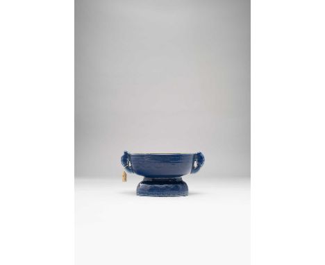 A CHINESE ARCHAISTIC COBALT BLUE-GLAZED RITUAL VESSEL, GUISIX CHARACTER JIAQING MARK AND OF THE PERIOD 1796-1820The oval bowl