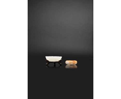 TWO CHINESE WHITE AND PALE CELADON JADE 'LOTUS' DISHES QING DYNASTYEach naturalistically carved in the form of a lotus bloom 