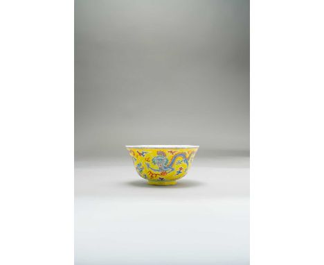 A CHINESE YELLOW GROUND 'DRAGON' BOWLFOUR CHARACTER JIAQING MARK AND OF THE PERIOD 1796-1820The exterior decorated with four 