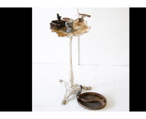 A contemporary cast iron white painted bird batch, the Lilypad bowl with moulded bird on a tapered stem on tripod support, 72