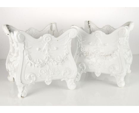A pair of Edwardian style cast iron white painted planters, of square waisted form with festoons of floral swags, C scrolls o