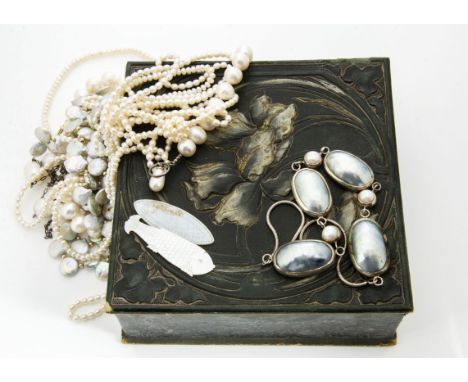 A large collection of pearls, comprising seed, cultured seawater, freshwater, baroque, pearl necklaces, etc in an Art Nouveau