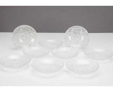 A set of nine Art Deco style frosted ice bowls, of circular design, the shallow bowl with smooth surface with moulded floral 
