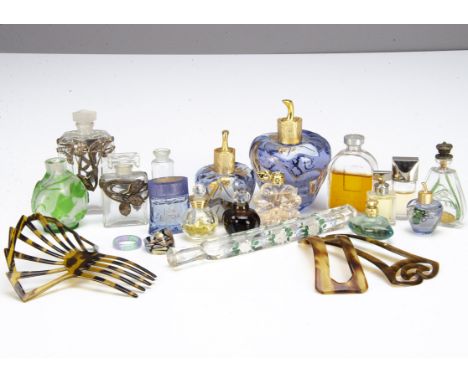 A collection of early 20th Century and later miniature perfume bottles, including a flattened triangular example with moulded