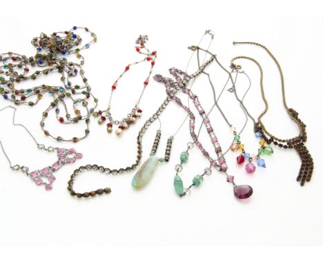 A collection of early 20th Century and later paste set necklaces, including gilt metal enamel floral fringe examples, paste s