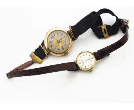 An early 20th Century 9ct gold lady's trench watch, with engine turned face, black enamel Roman Numerals, with silk cord stra