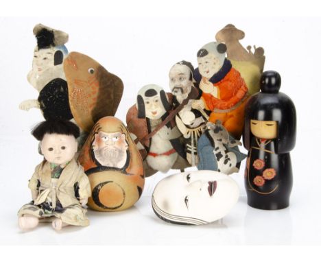 A collection of Japanese works of art, including a Noh theatre pottery mask, a Japanese composite doll of young baby boy, a c