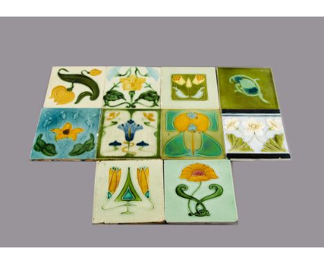 Ten British Art Nouveau relief moulded tiles, all with floral decoration, unknown makers, 15cm square Crazed^ some have chips