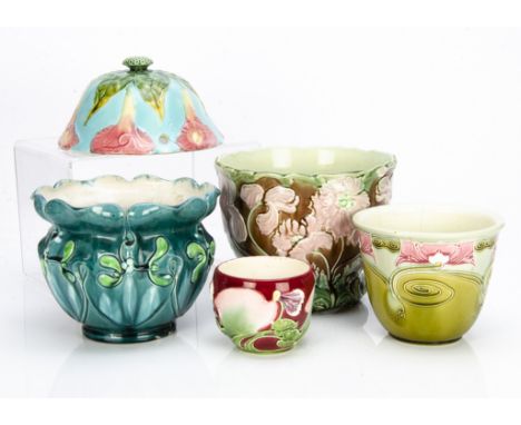 A collection of continental majolica jardinières, including  a hanging basket, with stylised pink Jack in the pulpit flowers 