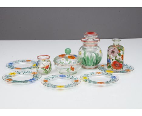 A collection of Art Deco painted floral glass items, including a jar and cover with white and yellow daffodil decoration, 14c