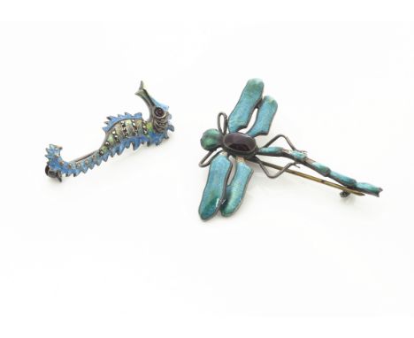 A continental silver and enamel dragonfly brooch, with red enamel abdomen and blue/green wings and head marked silver to reve