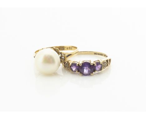 An 18ct gold and cultured pearl dress ring, ring size R, 3.8g and a 9ct gold amethyst and diamond dress ring, ring size R, 2.