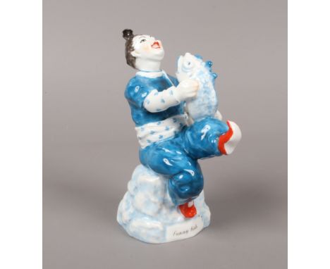 A Royal Worcester figure designed by Agnes Pinder Davies. Funny Fish from the Chinese Saying Series. Titled to the front, pri