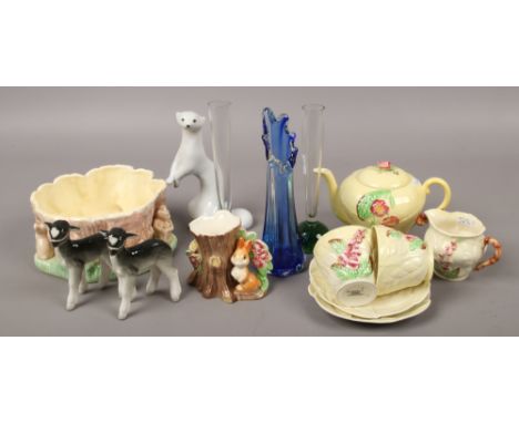 A group of collectables including a Carlton ware tea for two service, art glass, Sylvac, Russian ceramic model of a Weasel et