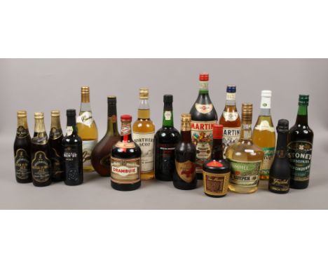 A large collection of full and sealed bottles of alcohol to include Cockburns Special Reserve Port, Janneau Grand Armagnac, N