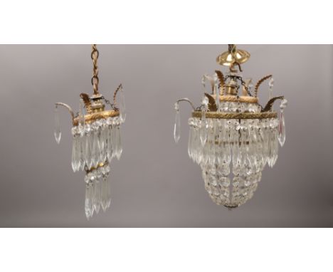 Two gilt metal chandelier pendants each with cut glass pendants.