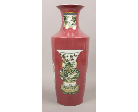 A Chinese famille verte high shouldered vase, mauve ground with vase shaped reserves painted with landscapes, underglaze Kang