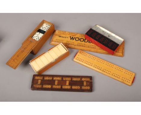 A box of dominoes and cribbage board to include Wills's examples.