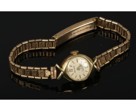 A ladies 14ct gold Gevea manual wristwatch on rolled gold strap.Condition report intended as a guide only.Running.