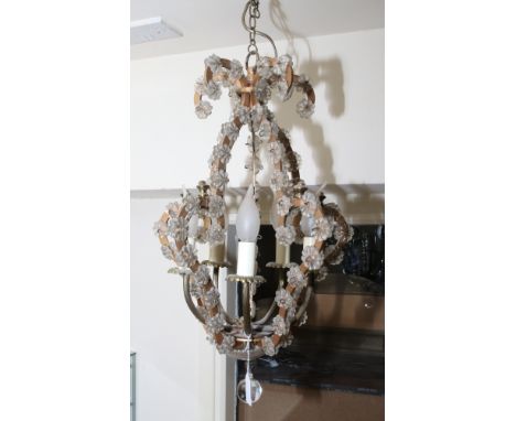 A gilt metal five branch chandelier with hand blown glass floral decoration, H 70cm x W 32cm.