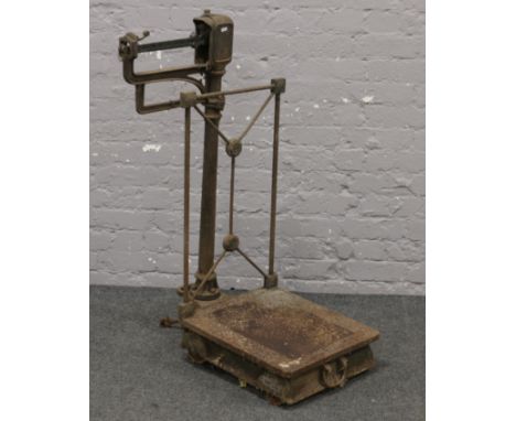 A set of portable cast iron sack scales.