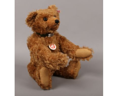 A boxed Steiff fully jointed teddy bear with growler, limited edition of 3000 with certificate, 38cm.