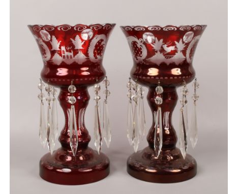 A pair of flashed ruby glass lustres.