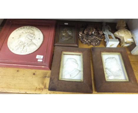 A collection of items depicting Henry Irving, to include circular plaque, mounted on red painted frame, rectangular plaque in