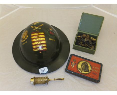 A World War I tin hat with painted decoration inscribed "Artist's Rifles 1915-16 Quo Fata Vocant 16-18 Royal Berkshire Reg Ch