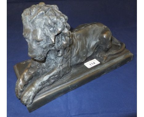 A cold cast bronze figure of a recumbent lion inscribed "Ronald Moll Ilfracombe 63" and inscribed "R Moll 344/750" 