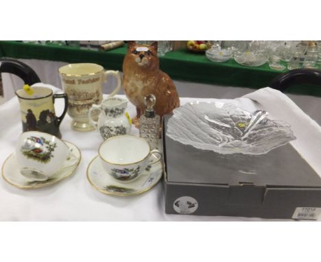A collection of china and glassware to include Beswick cat, Doulton jug, Worcester jug, Mats Jonasson leaf dish, etc.