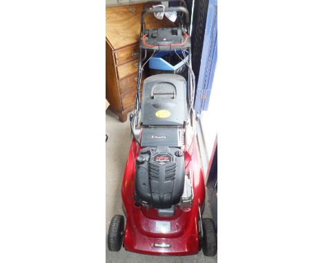 A Mountfield M6 powered petrol driven lawn mower with grass collector and Briggs & Stratton engine