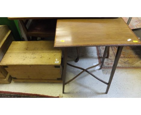 An Edwardian mahogany and satinwood cross-banded occasional table on square tapered legs united by a shaped X stretcher, toge