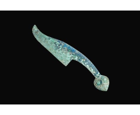Full title: A Chinese bronze dagger with serpent heads, Warring States PeriodDescription:L.: 30 x 6 cm  Provenance:- The coll