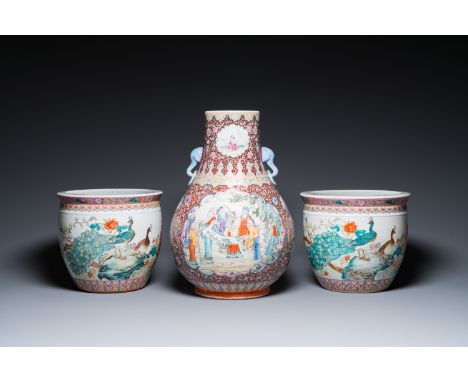 Full title: A Chinese famille rose 'hu vase' and a pair of fish bowls, 20th C.Description:H.: 49,5 cm (the vase)Dia.: 30 cm -