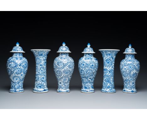 Full title: A Chinese blue and white garniture of six vases with floral design, KangxiDescription:H.: 23 cm (the tallest)
