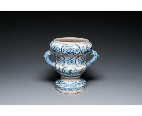 Full title: A large blue and white two-handled Frisian Delftware jardiniere with dolphin handles, Makkum, 18th C.Description: