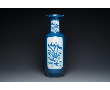 Full title: A Chinese blue-ground rouleau vase with blue and white landscape panels, 19th C.Description:H.: 63,5 cm  Provenan