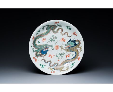 Full title: A Chinese famille verte 'dragons' dish, Chenghua mark, KangxiDescription:Dia.: 34,5 cm