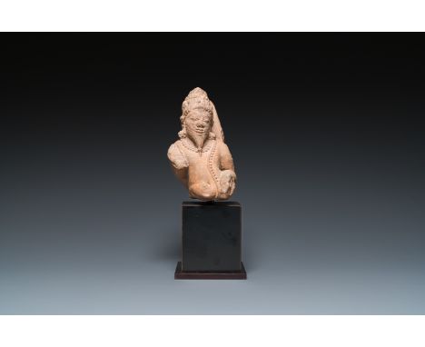 Full title: A sandstone Rishi sculpture, Madhya Pradesh, India, Candella period, 11/12th C.Description:H.: 26 cm (incl. base)