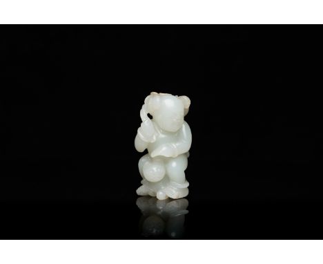Full title: A Chinese celadon jade sculpture of a boy with a cat, QingDescription:H.: 5,5 cm