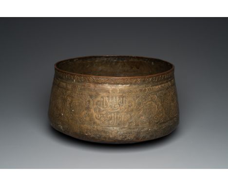 Full title: A large Islamic engraved bronze basin with calligraphic design, probably Egypt, 18/19th C.Description:Dia.: 39 cm