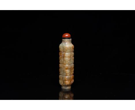Full title: A Chinese celadon and russet jade 'cong' snuff bottle, probably QingDescription:H.: 8,5 cmCondition: (UV-checked)