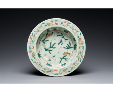 Full title: A Chinese famille rose celadon-ground 'carps' basin, 19th C.Description:Dia.: 29,5 cm - H.: 8 cm