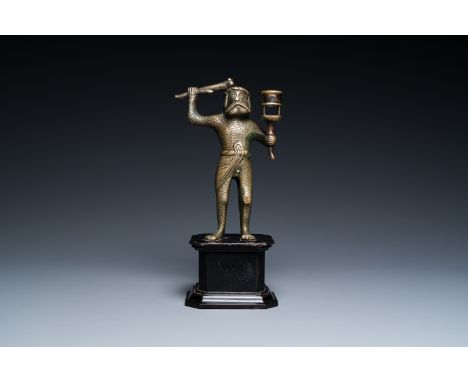 Full title: A rare bronze 'wild man' candlestick, Flanders or Germany, 15/16th C.Description:H.: 25 cm (incl. stand)H.: 18 cm