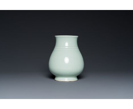 Full title: A Chinese celadon 'hu' vase, Qianlong mark, 19/20th C.Description:H.: 18 cm