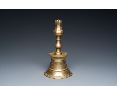 Full title: An Ottoman bronze candlestick with tulip-shaped sconce, Turkey, 17th C.Description:H.: 31 cm